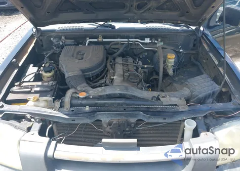 2002 Nissan Frontier Xe z USA, uszkodzony, nr VIN 1N6DD26S02C346798